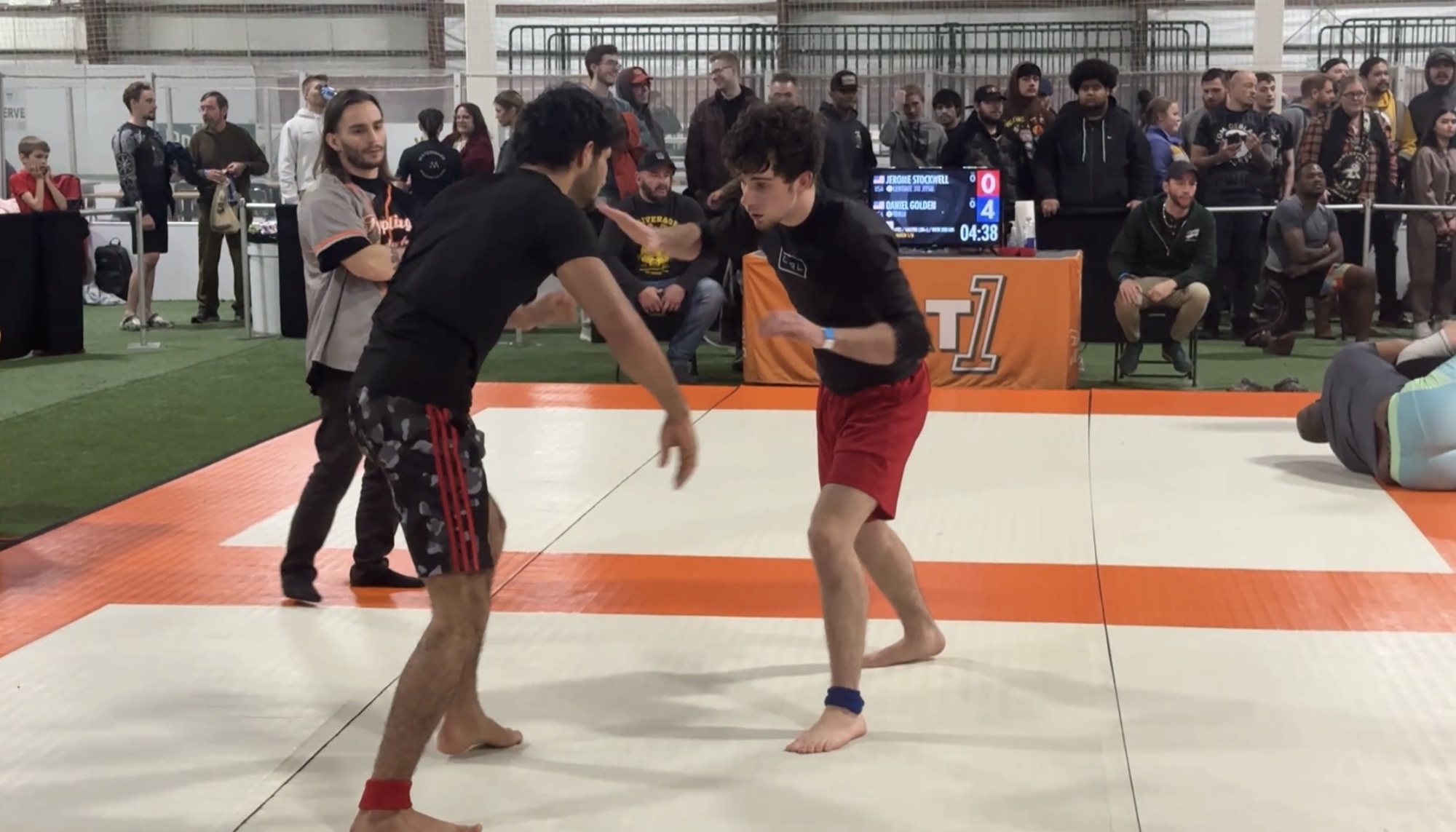 Charlie Wilson facing an opponent in a no-gi grappling competition